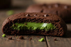 matcha chocolate cookie broken with high focus on inner green filling